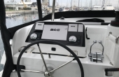 4_lagoon-42-steering Private Jet Sales and Charters - Lagoon 42 - Sunrise | Family Sailing Catamaran Charter